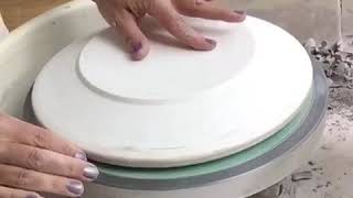 Using the pottery wheel to throw dinner plates on plaster forms [upl. by Lipscomb857]