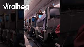 Airline Passenger Upset at Reclined Seat  ViralHog [upl. by Ellersick764]