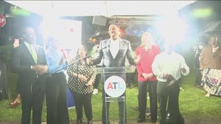 Atlanta mayor helps install new street lights to reduce crime crashes [upl. by Aisatsanna]