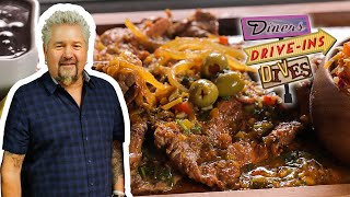 Guy Fieri Eats Churrasco Cuban Chimichurri Steak  Diners DriveIns and Dives  Food Network [upl. by Anilev]