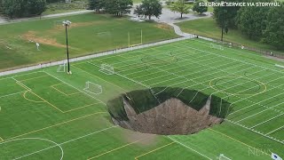 Massive sinkhole swallows part of soccer field in Illinois [upl. by Acirema]