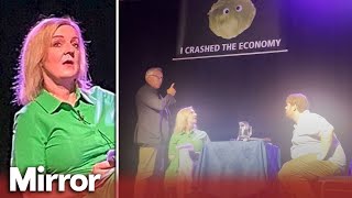 Liz Truss storms off stage after humiliating lettuce banner prank [upl. by Gnourt509]