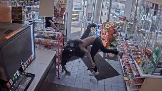 Surveillance video shows Detroit officer ambushed at gas station [upl. by Natasha]