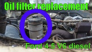 2005 Ford LCF power stroke 45L V6 oil filter replacement [upl. by Anaz684]