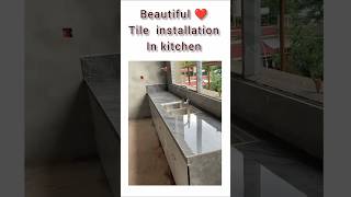 Tile installation in kitchen shorts construction [upl. by Hsirap]