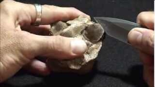 Demonstration of mineral cleavage using a muscovite mica crystal [upl. by Whit370]