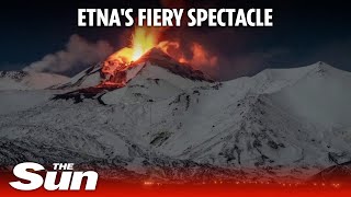 Snowy Mount Etna volcano roars into action spurting lava into night sky [upl. by Grose]