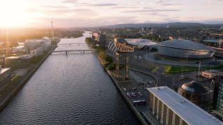 Glasgow sunset of River Clyde and City Centre by Drone in Scotland  AO Aerials cinematography [upl. by Yssis]