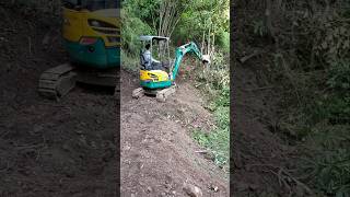 This man from China is digging a path on the mountain with the help of a JCB [upl. by Arndt]