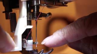 HOW TO USE THE AUTOMATIC NEEDLE THREADER ON A SINGER SEWING MACHINE 4166 tutorial [upl. by Jim529]