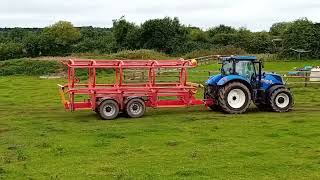 20 Bales in 1 minute  New Holland T7210 amp Keltec Bale Carriers [upl. by Gleeson]