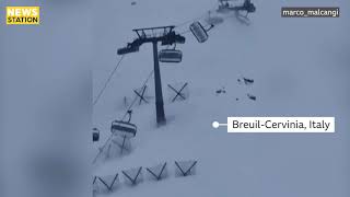 Strong winds jolt Italy ski lift with passengers on board [upl. by Eenrahc928]