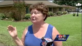 Sandbag levees hold back water breach in St James Parish [upl. by Bray]