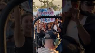 Emma Chamberlain holding a quotPlease play Espressoquot sign during Sabrina Carpenters Coachella set W2 [upl. by Dagny]