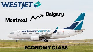 WestJet TRANSCONTINETAL FLIGHT from MONTREAL Boeing 737700 Economy Class TRIP REPORT [upl. by Ardeen]