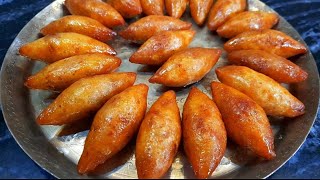 Mug Puli Pitha  সেরা স্বাদের মুগ পুলি পিঠা রেসিপি  Bengali Pithe Puli Recipe  Moong Shamli Pitha [upl. by Enrika921]