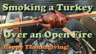 Smoking a Whole Turkey over an Open Fire [upl. by Ardnuasal893]