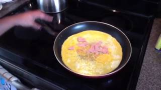 Comment faire un jambon et fromage omelette [upl. by Filahk]