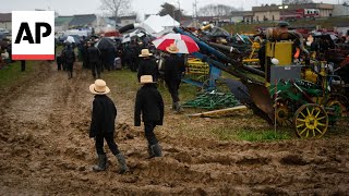 Fundraising auctions at Pennsylvanias annual Amish mud sale [upl. by Deadman]