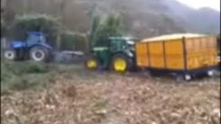 New Holland Tsa 125 y John Deere 6930 sacando el remolque de maiz [upl. by Alehs]