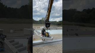 Unilock steps goin down with the mquip blizzard MQUIP hardscape construction excavator work [upl. by Itnuahsa]