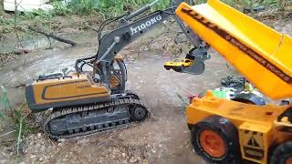 Excavator moving around the canal Excavator scoops up the crashed cars that fell into the canal [upl. by Drhacir]