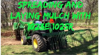 Using John Deere 1023E 1025R to Lay And Spread Mulch [upl. by Countess762]