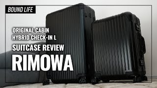 RIMOWA（リモワ）のORIGINAL CABINとHYBRID CHECKIN Lのブラックをレビュー。デザイン良しで安心保証のスーツケースです！ [upl. by Naoma732]