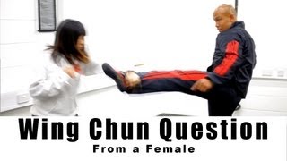 wing chun Training  from a female how to block round kick Q8 [upl. by Santoro]