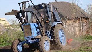 Tractor MTZ82 plowing the garden  Трактор МТЗ82 вспашка огорода [upl. by Sylirama]