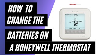 How To Change the Batteries on a Honeywell Thermostat [upl. by Morissa]