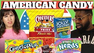 BRITISH PEOPLE TRY AMERICAN CANDY TOOTSIE ROLLS NERDS JOLLY RANCHER CHESTERS amp GOBSTOPPER [upl. by Phineas]