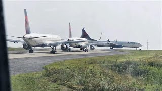 Delta plane taxiing for departure clipped by another plane at Atlanta airport [upl. by Annaeed]