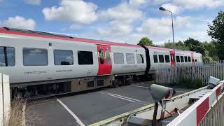 2 TRAINS AND RARE BARRIERS Pembrey and Burry Port Level Crossing Carmarthenshire 030924 [upl. by Lewak216]