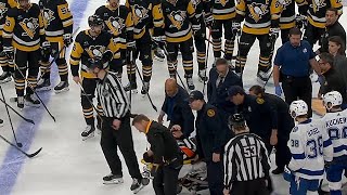 Referee Steve Kozari Stretchered Off Ice After A Scary Collision With Hayden Fleury [upl. by Akeihsal]