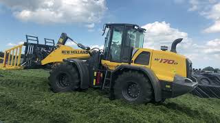 Silage Clamping with NEW HOLLAND W170D Stage V wheel loader with joystick steering [upl. by Palm]