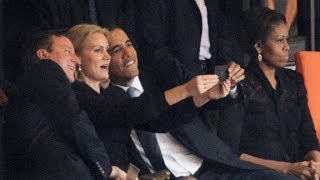 Obama snaps selfie at Mandela memorial [upl. by Hersch301]