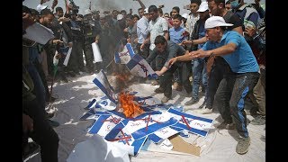 Israeli flags burn as protests on Gaza border move into third week [upl. by Eelloh]