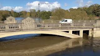 The flooded River Severn from the old bridge at Atcham Shrewsbury Shropshire [upl. by Carmina]