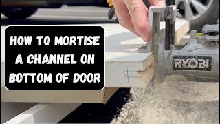 How to cut a channel or groove on the bottom of a door [upl. by Nynnahs]