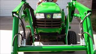 Attaching the John Deere 45 Front End Loader [upl. by Natika583]