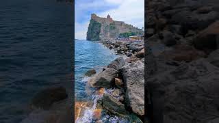 Waves crashing on the rocks underneath the Aragonese Castle in Ischia Naples [upl. by Vinna726]