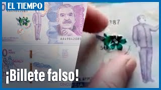 Cuidado con estos billetes falsos de 50000 pesos [upl. by Stuckey995]