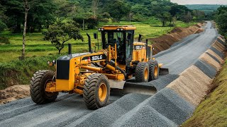 The main technology yellow motor grader machine with the brand SDLG Making pushes layers of gravel [upl. by Obediah614]