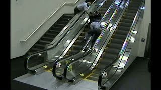 Woman in wheelchair tumbles down escalator at Portland airport [upl. by Lucilia]