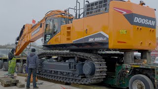 Moving New Doosan DX800 Excavator From Dealers Yard [upl. by Etnuahs290]