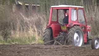 MF 148 Harrowing with MF 770 spiketooth harrows [upl. by Middendorf39]