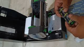 TSC Printer Ribbon and Roll InstallationHow to Install Ribbon and Sticker Roll in TSC Printertsc [upl. by Mayyahk]