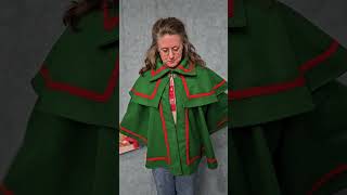 How to Wear a Caroling Cape and hold sheet music [upl. by Norrv]