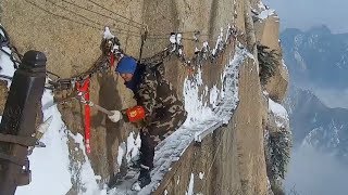 Workers Clear Snow on Dangerous Cliff [upl. by Yauqram]